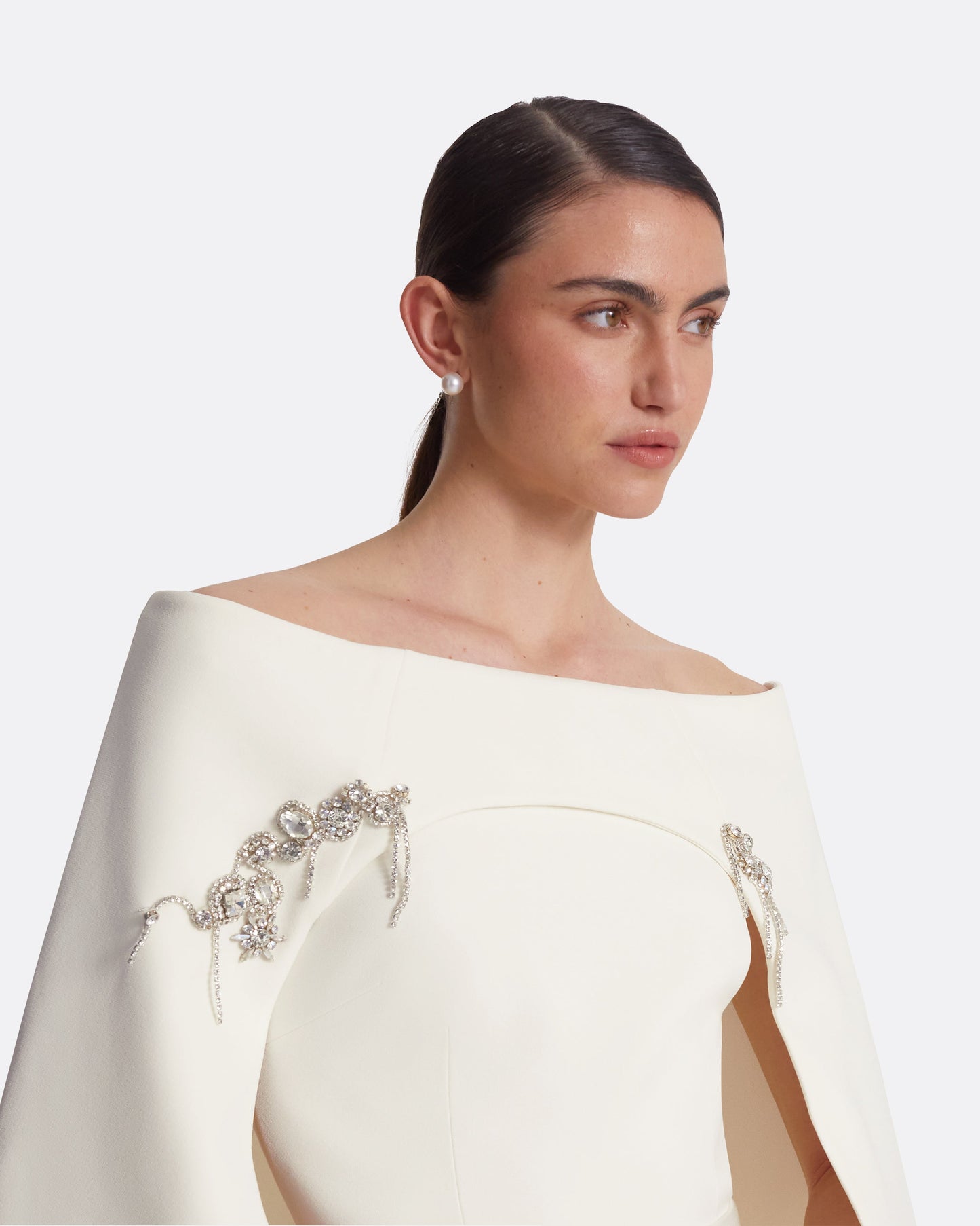 Manorel Ivory Harness & Myrine Jumpsuit